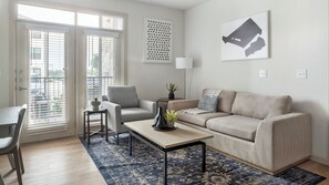 Living area - Landing Apartments Pflugerville (Pflugerville)