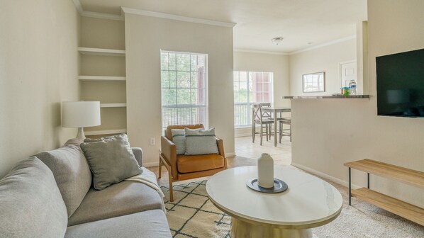 Apartment, 1 Bedroom | Living area | 40-inch TV with digital channels