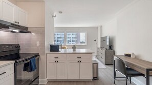 Studio | Private kitchen | Full-size fridge, microwave, oven, stovetop