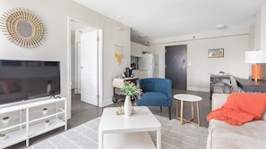 Apartment, 1 Bedroom | Living area | 40-inch TV with digital channels - Landing St. Petersburg (St. Petersburg)