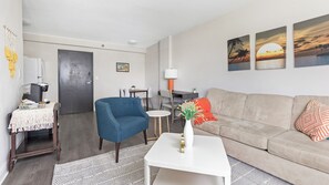 Apartment, 1 Bedroom | Living area | 40-inch TV with digital channels