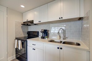 Apartament, 2 dormitoris | Cuina privada | Frigorífic gran, microones, forn i placa de cuina 
