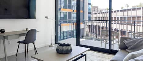 Departamento, 1 habitación | Área de sala de estar | Televisión de 40 pulgadas con canales digitales
