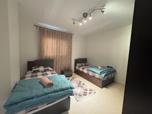 2 dormitorios, tabla de planchar con plancha, wifi
