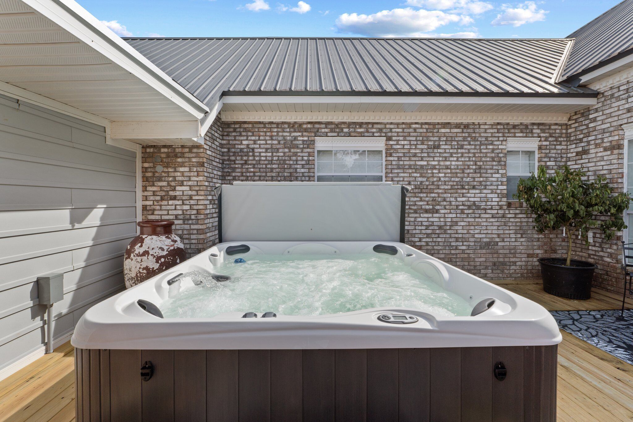 Bañera de hidromasaje al aire libre