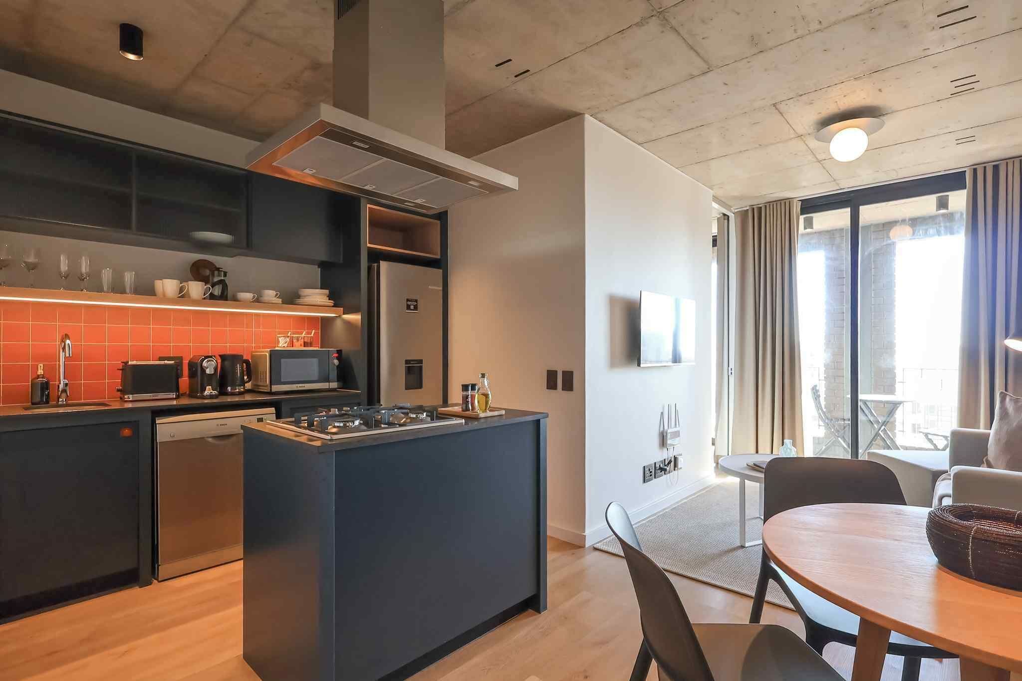 Compact One Bedroom | Private kitchen | Full-sized fridge, oven, espresso maker, coffee/tea maker