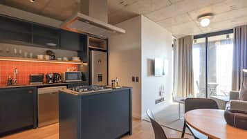 Compact One Bedroom | Private kitchen | Full-sized fridge, oven, espresso maker, coffee/tea maker