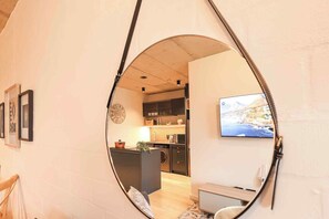Compact One Bedroom | Living area | Smart TV, Netflix, streaming services - THREE43 on B - Fluent Serviced Apartments (Cape Town)