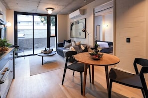 Three Bedroom | Living area | Smart TV, Netflix, streaming services - THREE43 on B - Fluent Serviced Apartments (Cape Town)