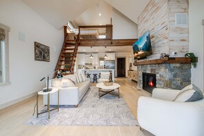 House, Multiple Beds, Hot Tub, Mountain View (Wilderness Club Golfer's Cottage) | Living area | 65-inch flat-screen TV with digital channels, fireplace