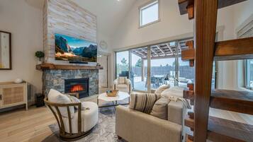 House, Multiple Beds, Hot Tub, Mountain View (Wilderness Club Golfer's Cottage) | Living area | 65-inch flat-screen TV with digital channels, fireplace