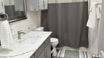 Shower, towels, soap, shampoo