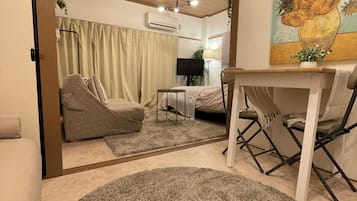 Deluxe Apartment, City View | In-room safe, blackout curtains, soundproofing, iron/ironing board