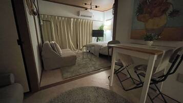 Deluxe Apartment, City View | In-room safe, blackout drapes, soundproofing, iron/ironing board
