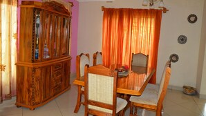 Family Triple Room, Garden View | In-room dining - Chobe Kulotu Guest House  (Kasane)
