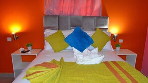 Family Triple Room, Garden View | Desk, laptop workspace, WiFi (free), individually decorated - Chobe Kulotu Guest House  (Kasane)