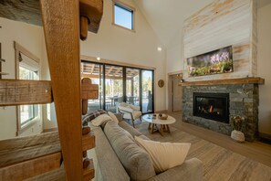 House, Multiple Beds, Hot Tub, Mountain View (Wilderness Club Nest) | Living area | 50-inch flat-screen TV with digital channels, fireplace