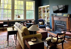 Smart TV, fireplace, books