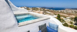 A pool with a view of a coastal town. - Villa Castelli - Five Bedroom Villa, Sleeps 10 (Pirgos Kallistis)