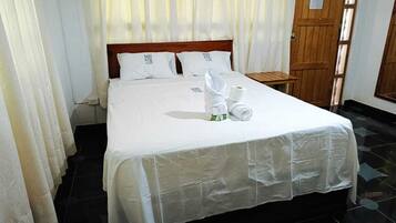 Standard Cabin, Garden View | Desk, laptop workspace, free WiFi