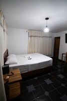 Standard Cabin, Garden View | Desk, laptop workspace, free WiFi