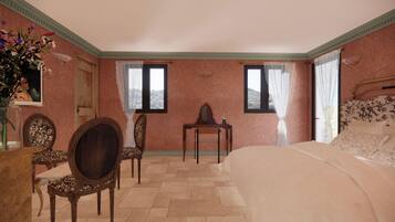 A bedroom with a large bed, two chairs, a small table, and a mirror. There are two windows with curtains, a vase with flowers, and a wall-mounted lamp.