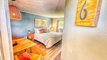 1 bedroom, desk, iron/ironing board, travel crib