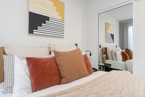 2 dormitorios, escritorio, tabla de planchar con plancha y wifi