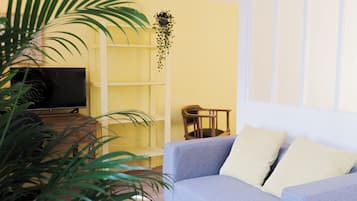 Superior appartement, uitzicht op stad | Woonruimte | Een flatscreentelevisie
