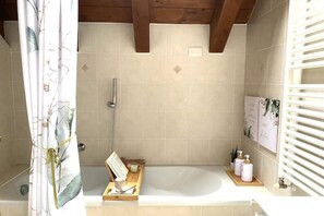 Hair dryer, bidet, towels, soap