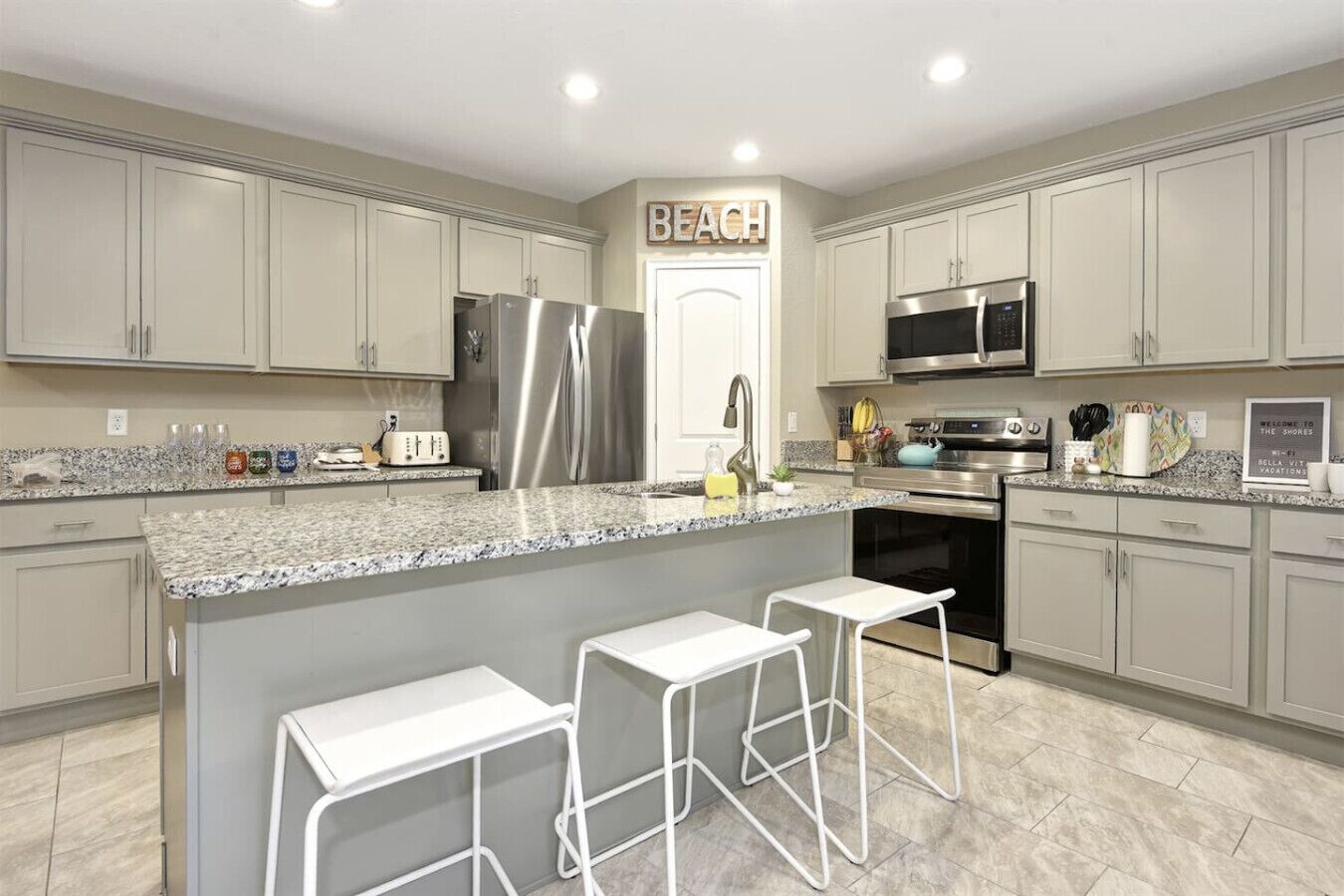 Coffee/tea maker, fridge, microwave, oven