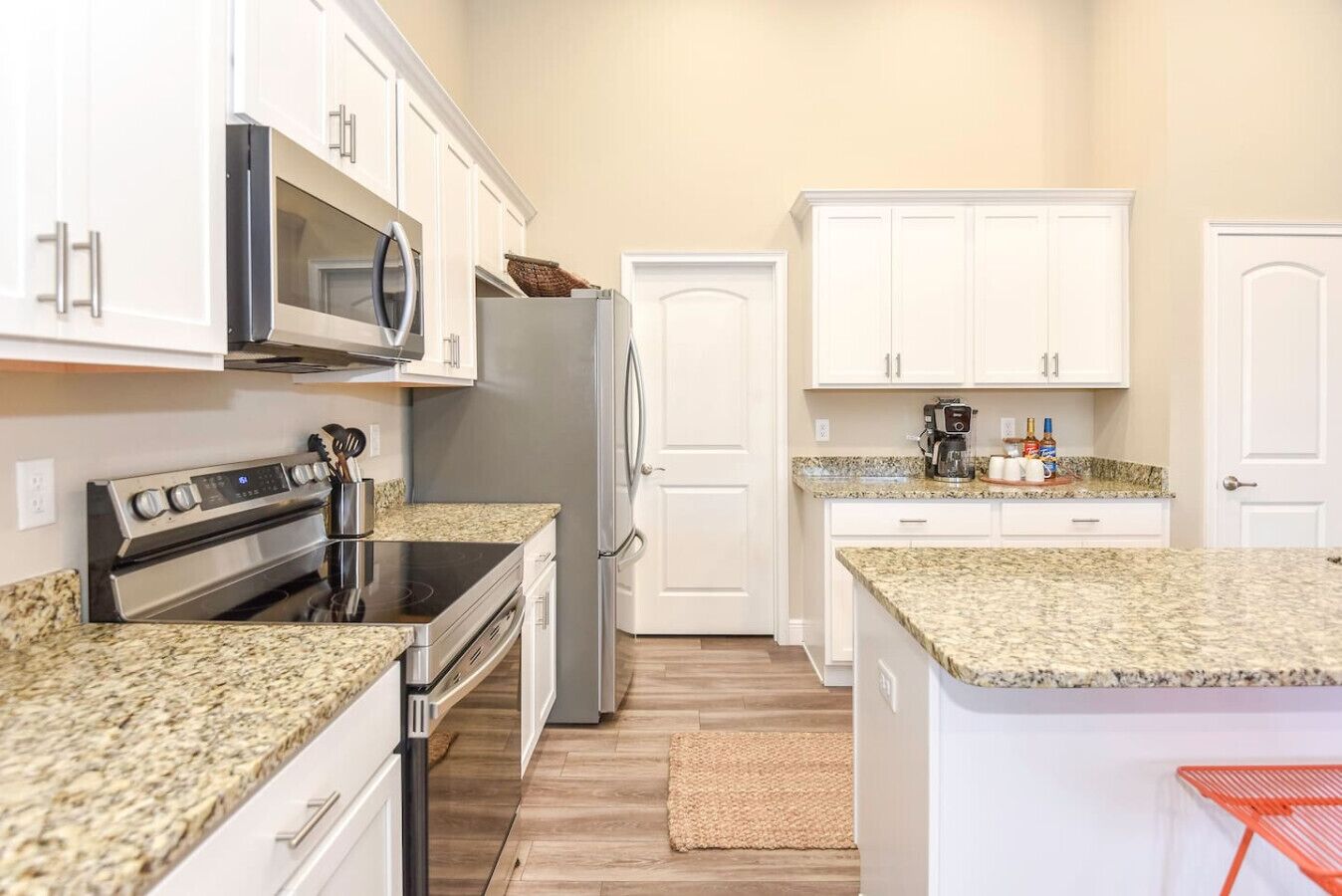 Coffee/tea maker, fridge, microwave, oven