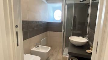 Hair dryer, bidet, towels, soap