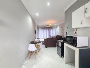 Apartamento conforto, varanda | Área de estar