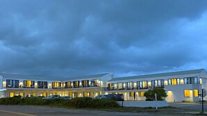 A modern hotel with multiple balconies and large windows. - Offshore Montauk (Montauk)