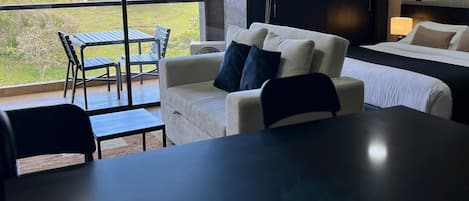 Suite Exclusive, vue jardin | Coin séjour