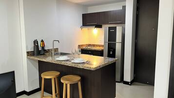 Exclusive Suite, Garden View | Private kitchen | Fridge, microwave, oven