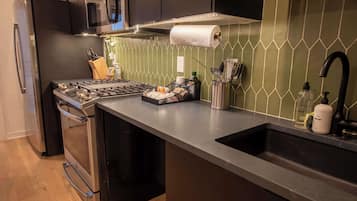 Apartment, 1 Bedroom, Patio, Ground Floor | Private kitchen | Full-size fridge, microwave, oven, stovetop
