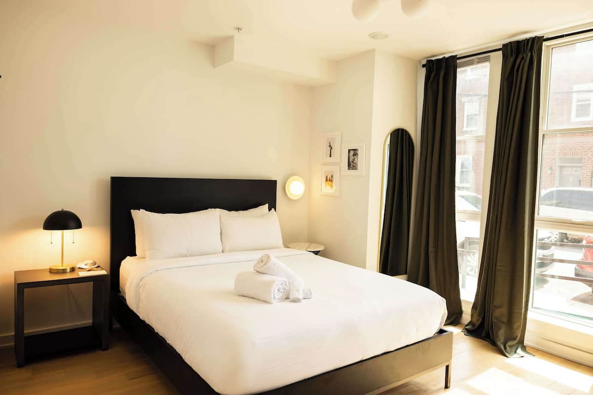 Apartment, 1 Bedroom, Patio, Ground Floor | 2 bedrooms, desk, laptop workspace, iron/ironing board