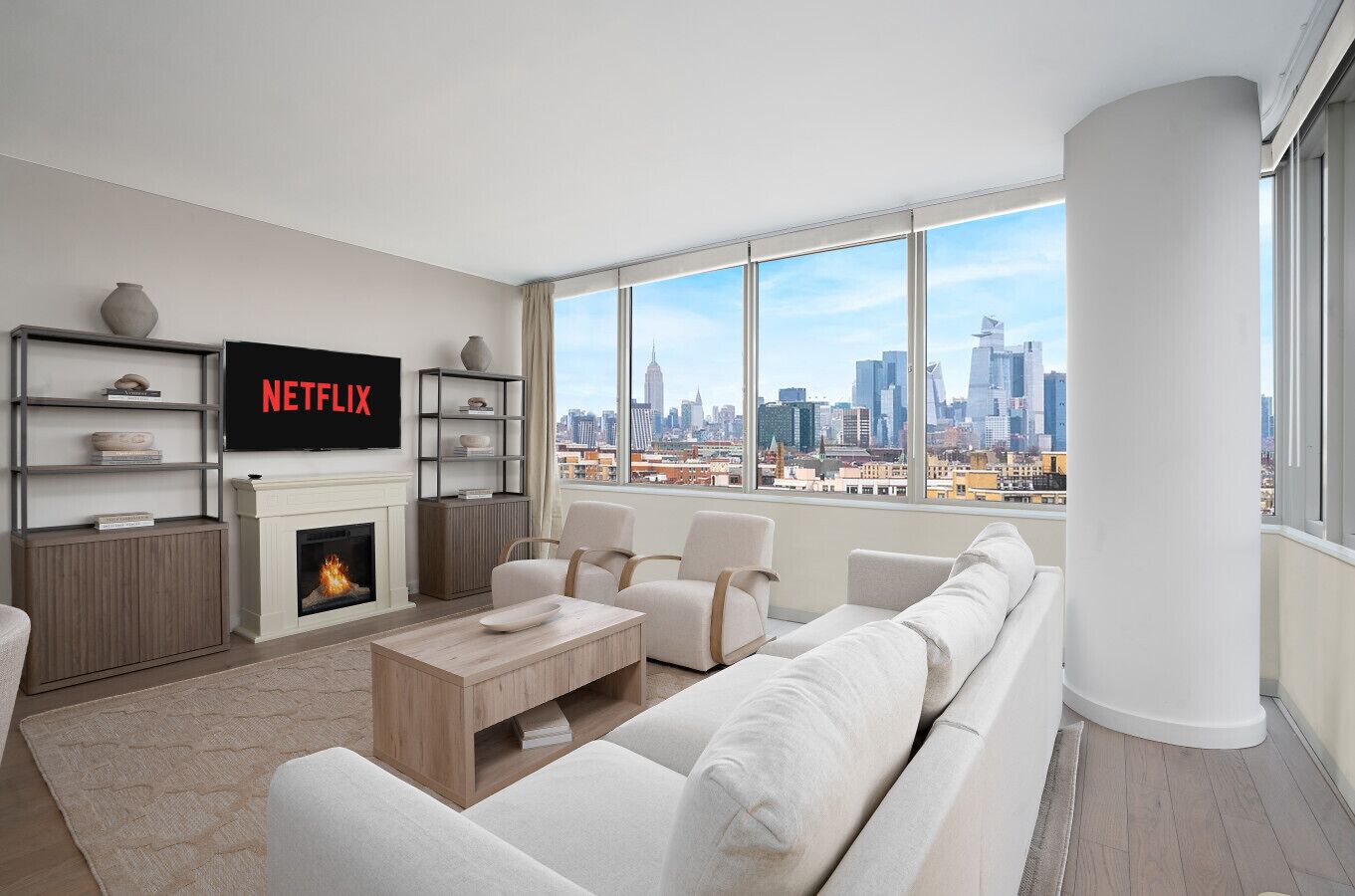 Una sala de estar moderna con chimenea, televisor grande y vista a la ciudad.