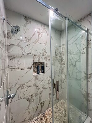 Shower, hair dryer, soap, shampoo