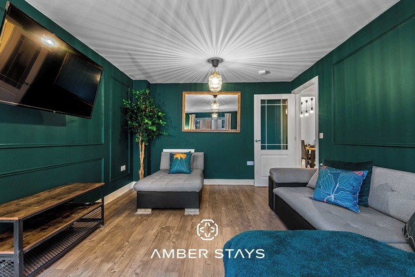 A thoughtfully designed space that blends style and comfort effortlessly—ideal for lounging, socializing, or settling in with a good movie.