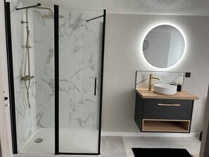 Shower, hair dryer, towels, soap