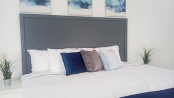 4 habitaciones, tabla de planchar con plancha, wifi y ropa de cama