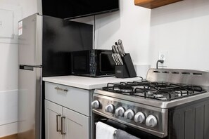 Fridge, microwave, oven, stovetop - Arbutus| King Suite| Hot Tub+Sauna| Rent Pontoons! (Traverse City)