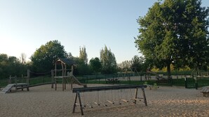 A playground with swings, a slide, and a climbing structure. - House for 6 people with a quiet garden in Les Sables d'Olonne (Les Sables-d'Olonne)