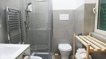 City Room | Bathroom | Hair dryer, slippers, bidet