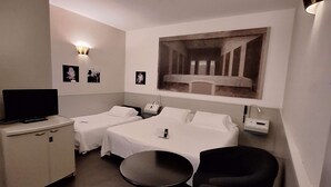 A hotel room with two beds, a television, a small table, and a large painting on the wall. - Sure Hotel By Best Western Milano (Padova)