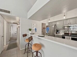 Microwave, oven, stovetop, dishwasher - Perfect Chandler Getaway – Cozy Condo in the Heart of the East Valley! (Chandler)