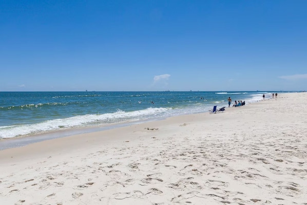 On the beach, sun-loungers, beach towels